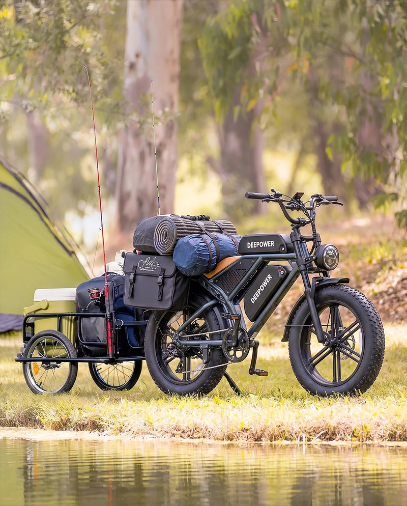QS7 with camping trailer by a lake